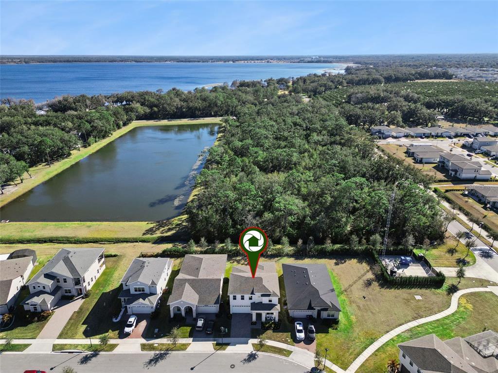 2932 Tupelo Loop St. Cloud, FL 34772 - Photo 36 of 47 an aerial view of a house with outdoor space