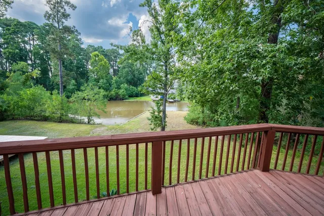 a view of balcony with wooden floor