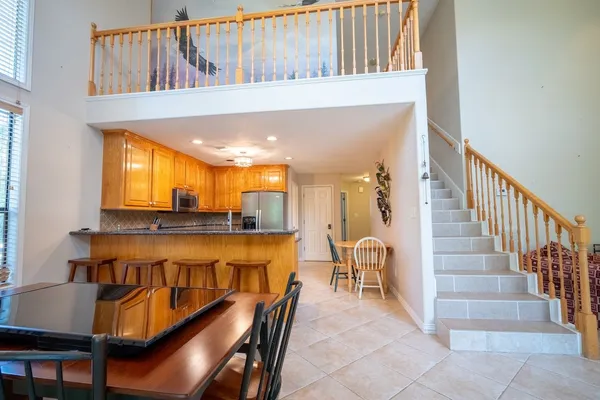 a view of a balcony with chairs