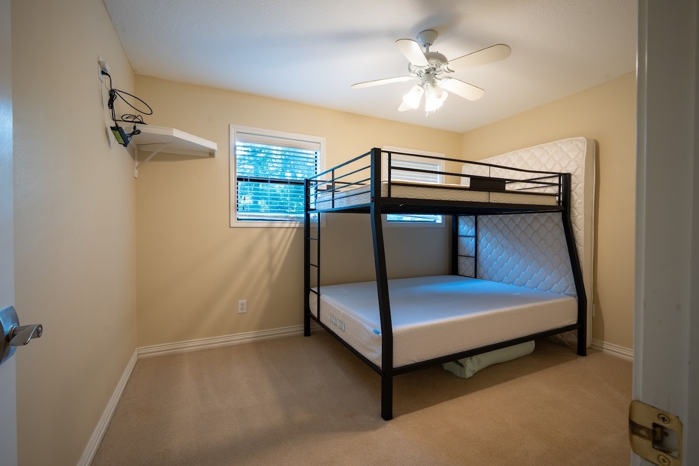 9 Creek Bend Trinity, TX 75862 - Photo 40 of 50 a bedroom with a bed and a ceiling fan