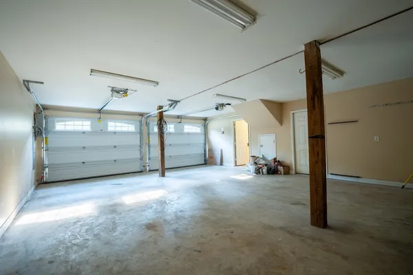a utility room with sink dryer and washer