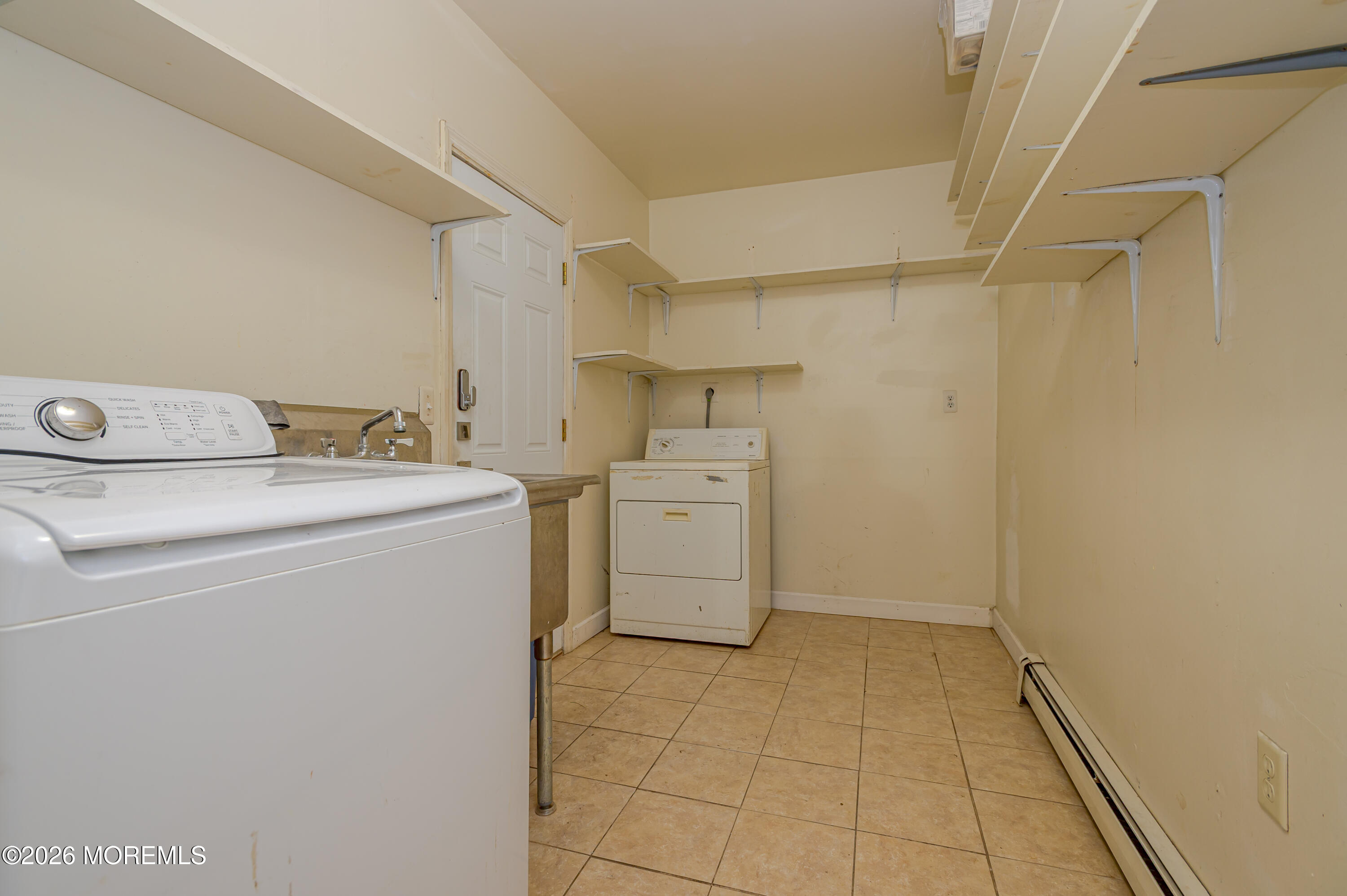 878 Green Valley Road Jackson, NJ 08527 - Photo 16 of 28 a utility room with dryer and washer