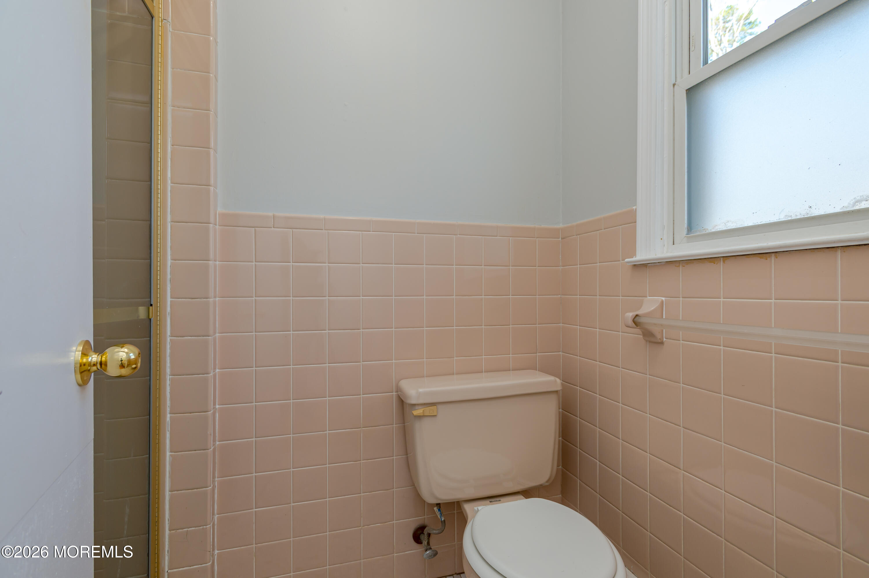 878 Green Valley Road Jackson, NJ 08527 - Photo 19 of 28 a white toilet sitting next to a bathroom