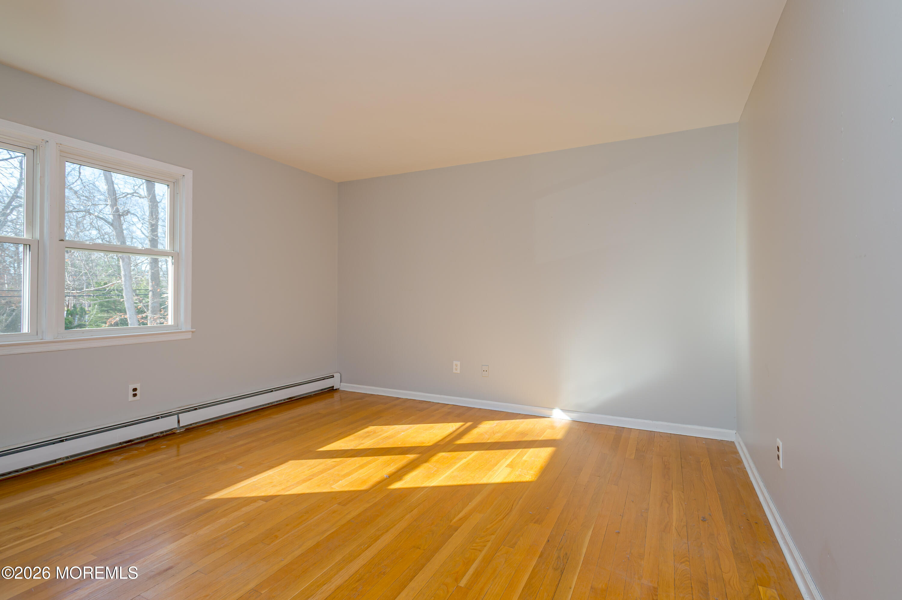878 Green Valley Road Jackson, NJ 08527 - Photo 21 of 28 wooden floor in a room with a window