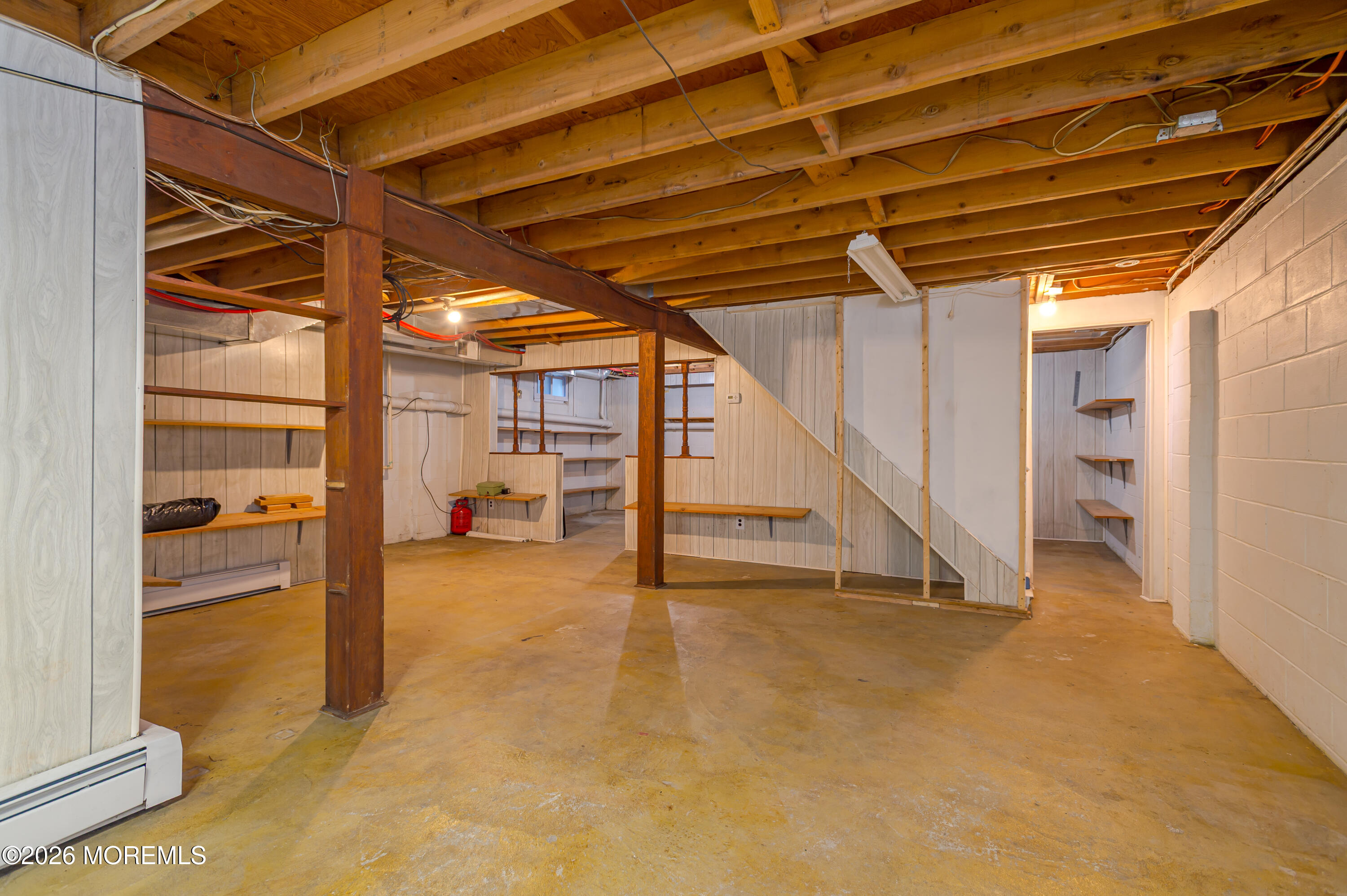 878 Green Valley Road Jackson, NJ 08527 - Photo 25 of 28 a view of an empty room with wooden floor