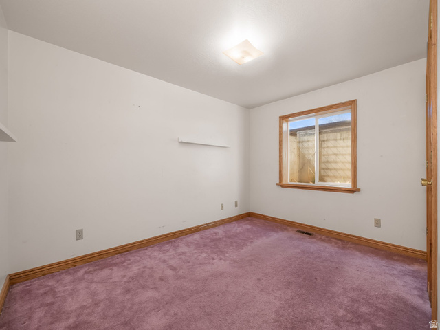 598 West 1600th Street North Mapleton, UT 84664 - Photo 16 of 34 Carpeted spare room featuring baseboards