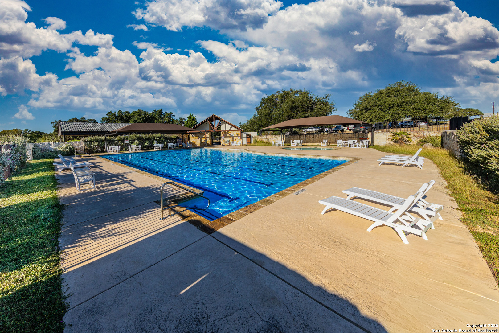 104 Capt Castro Blanco, TX 78606 - Photo 26 of 30 a view of swimming pool with outdoor seating and city view