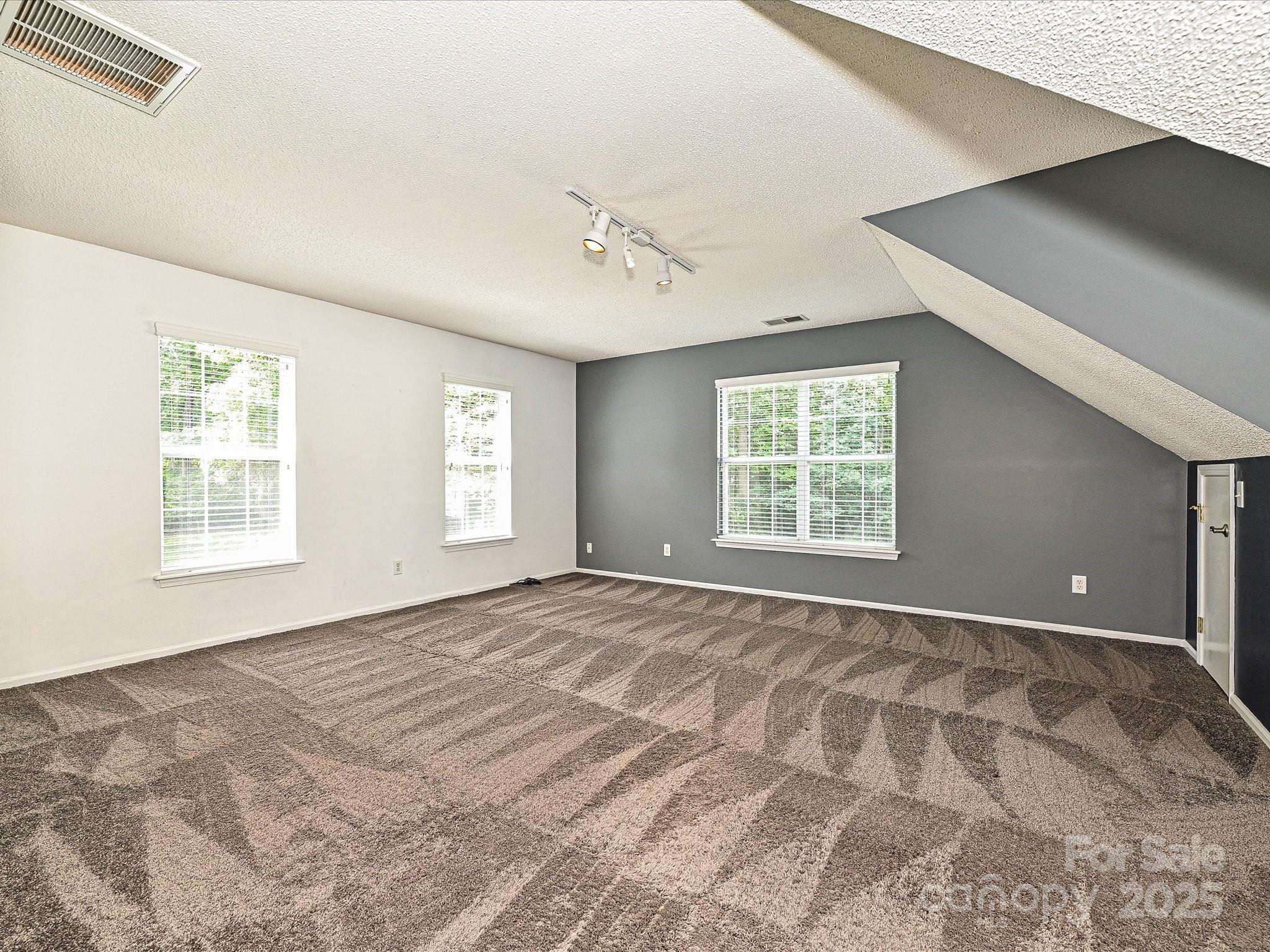 557 South Portman Lane Fort Mill, SC 29708 - Photo 23 of 29 a view of an empty room with a window