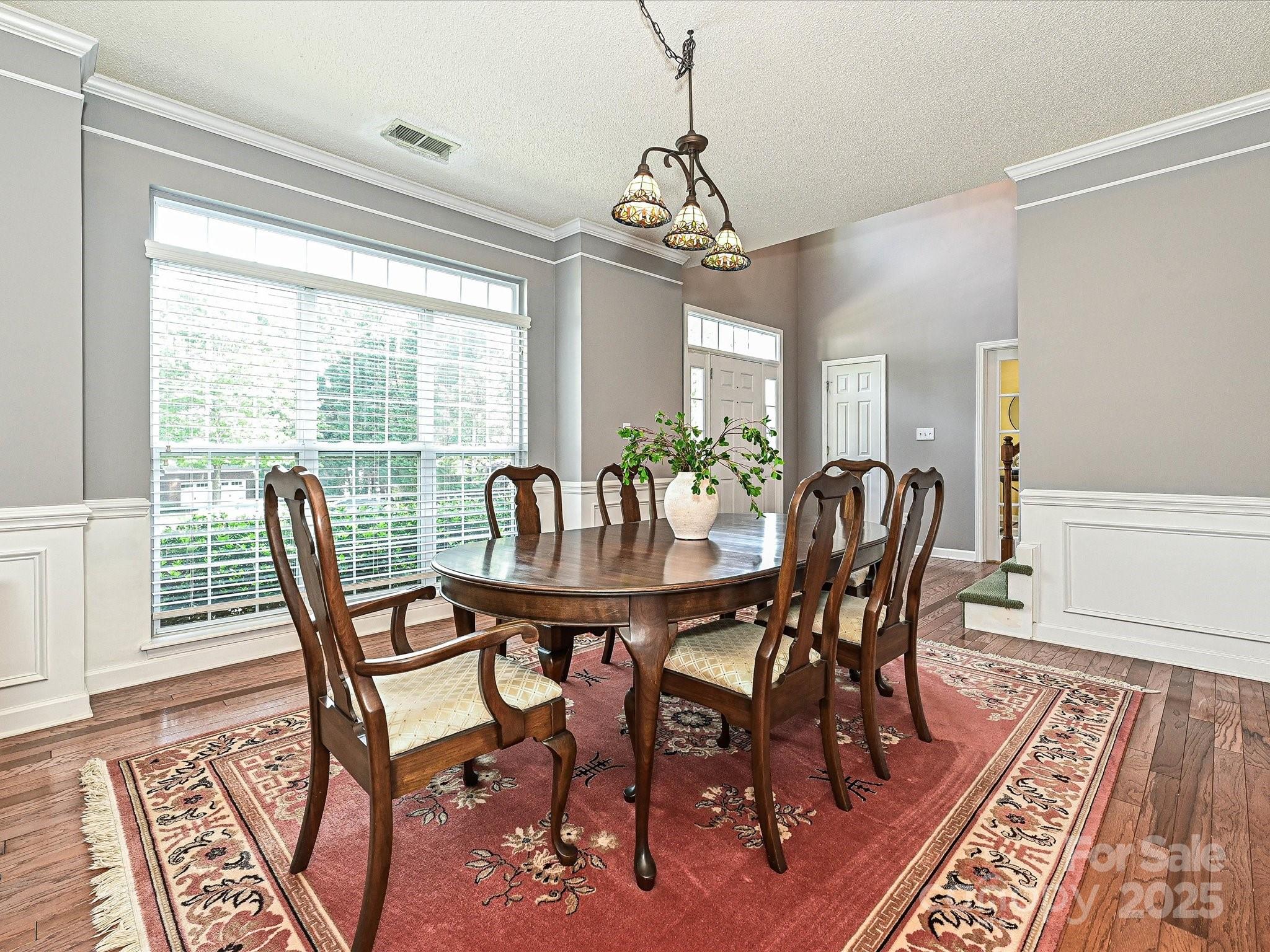 557 South Portman Lane Fort Mill, SC 29708 - Photo 4 of 29 a view of a dining room with furniture window and wooden floor