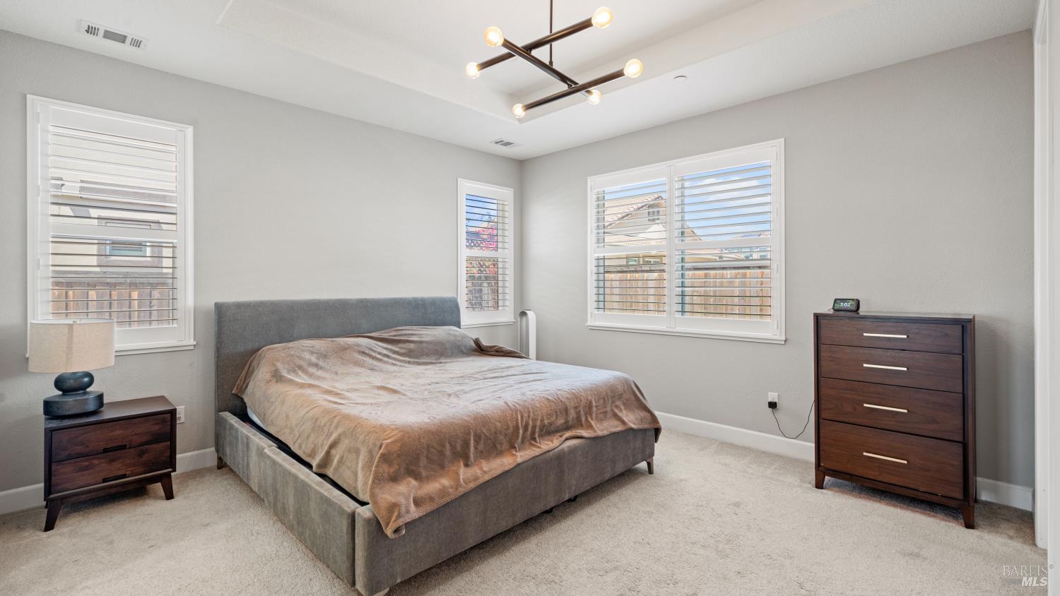 761 Razorbill Street Vacaville, CA 95688 - Photo 13 of 41 a bedroom with a bed and a window