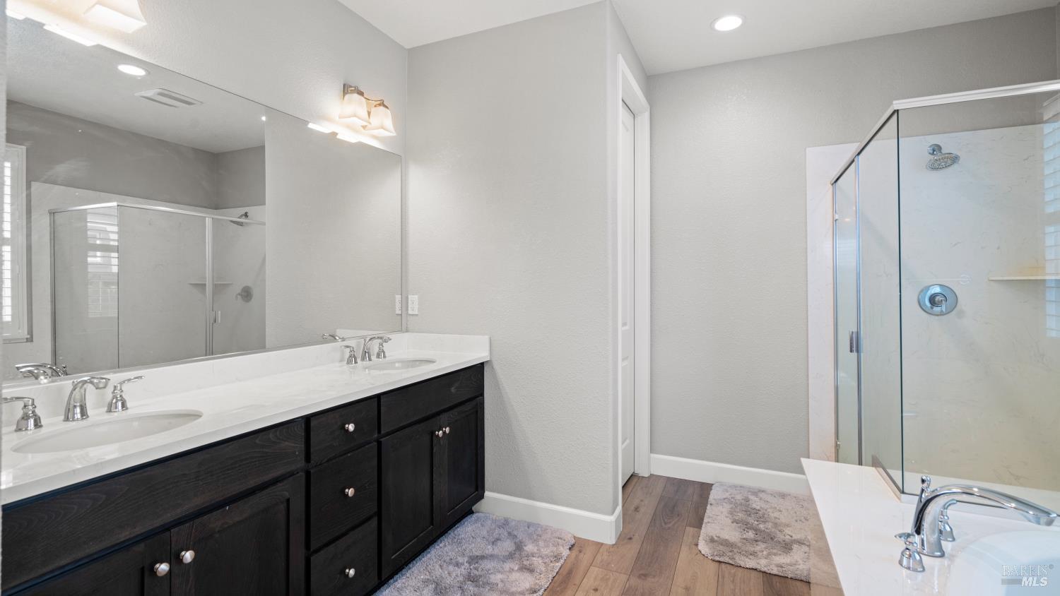 761 Razorbill Street Vacaville, CA 95688 - Photo 16 of 41 a bathroom with a double vanity sink mirror and double