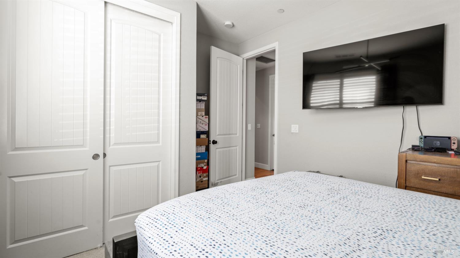 761 Razorbill Street Vacaville, CA 95688 - Photo 20 of 41 a bedroom with a bed and a flat screen tv