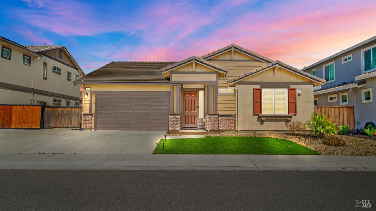 761 Razorbill Street Vacaville, CA 95688 - Photo 2 of 41 a front view of a house with yard and green space