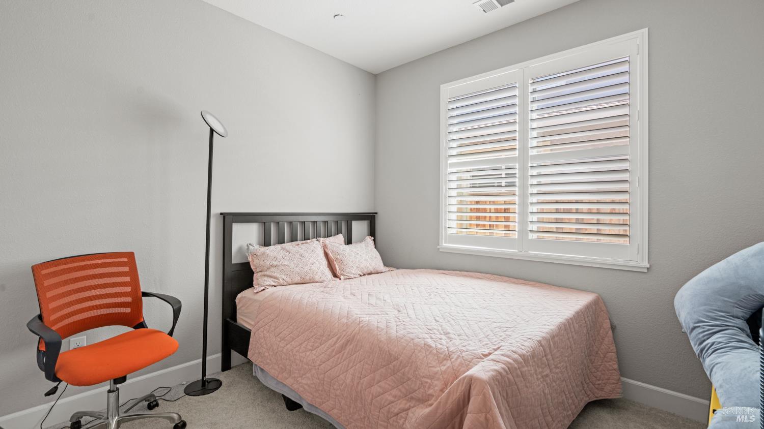 761 Razorbill Street Vacaville, CA 95688 - Photo 21 of 41 a bedroom with a bed and chair