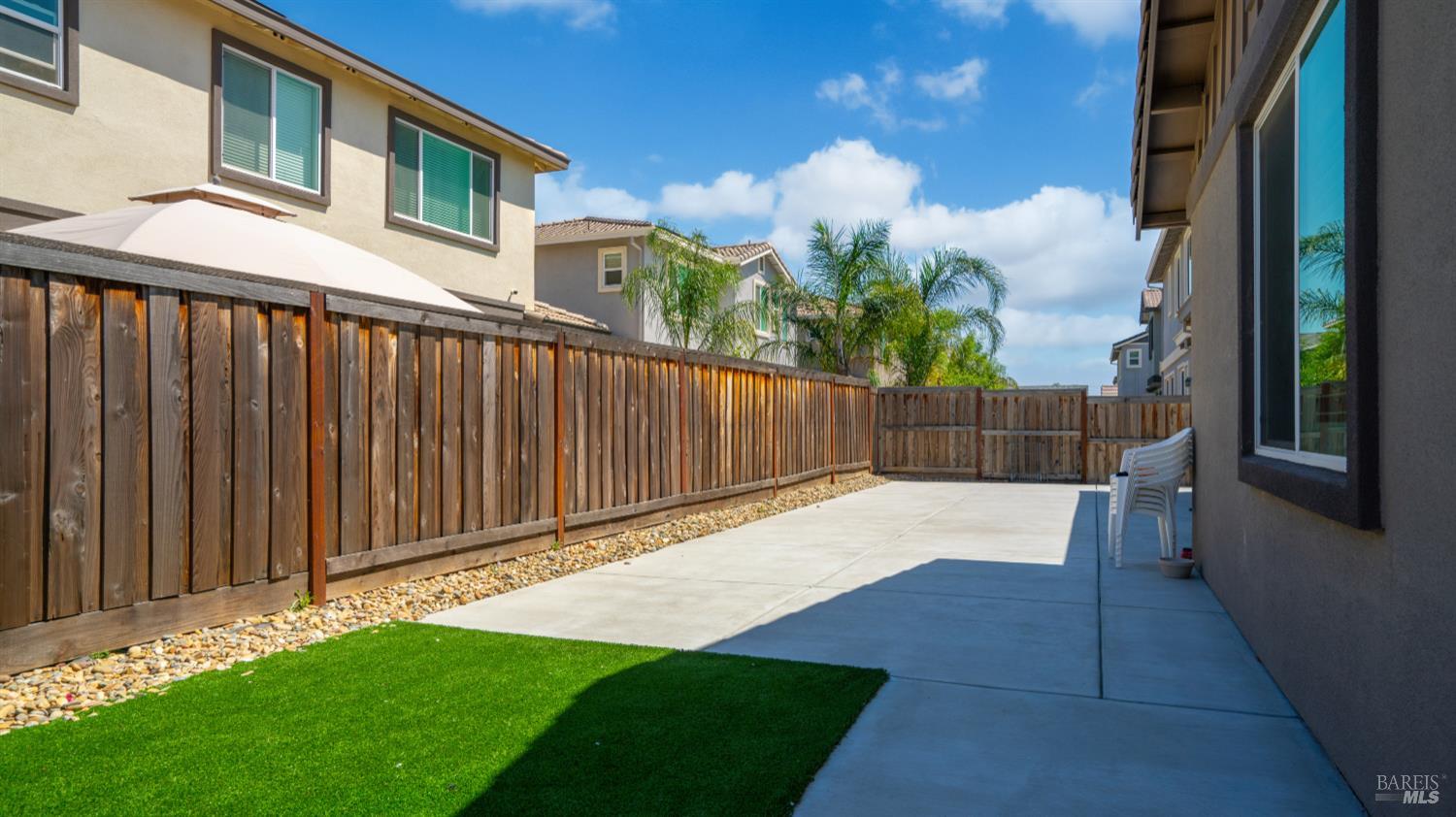 761 Razorbill Street Vacaville, CA 95688 - Photo 25 of 41 a backyard of a house with table and chairs