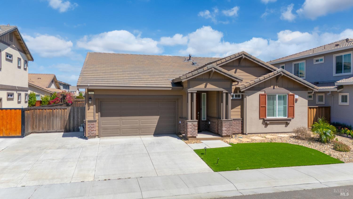 761 Razorbill Street Vacaville, CA 95688 - Photo 30 of 41 a front view of a house with a yard and garage