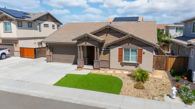 a view of a house with a patio