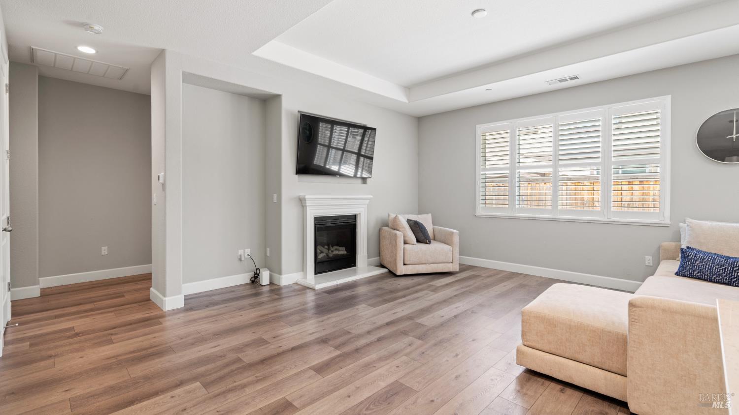 761 Razorbill Street Vacaville, CA 95688 - Photo 6 of 41 a living room with furniture and a fireplace
