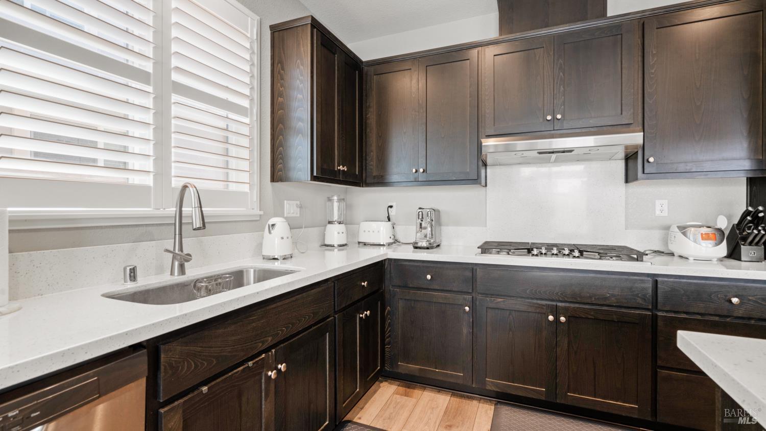 761 Razorbill Street Vacaville, CA 95688 - Photo 9 of 41 a kitchen with a sink and cabinets