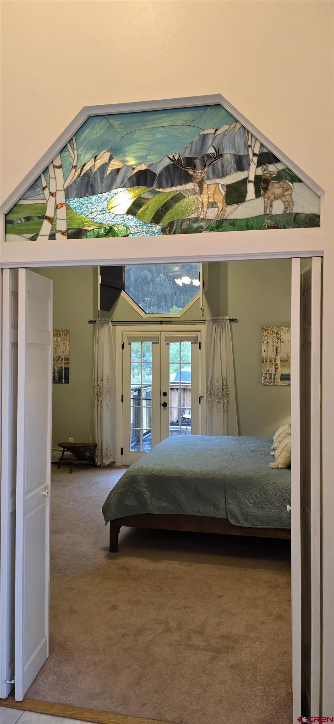 605 County Road 23 Ridgway, CO 81432 - Photo 17 of 26 a front view of a house with parking area