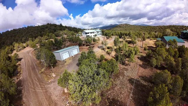 a view of a city with a building in the background