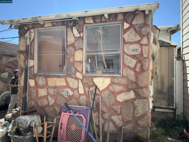 a front view of a house with a glass door