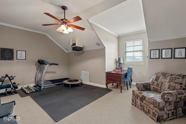 a living room with furniture a chandelier and a window