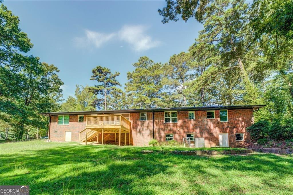 1288 Elva Drive Southwest Atlanta, GA 30331 - Photo 1 of 13 a view of a house with backyard