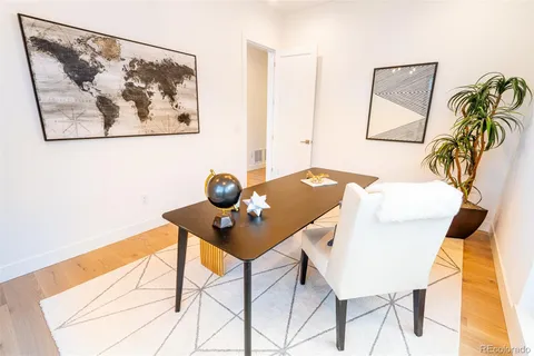 a view of a workspace with furniture