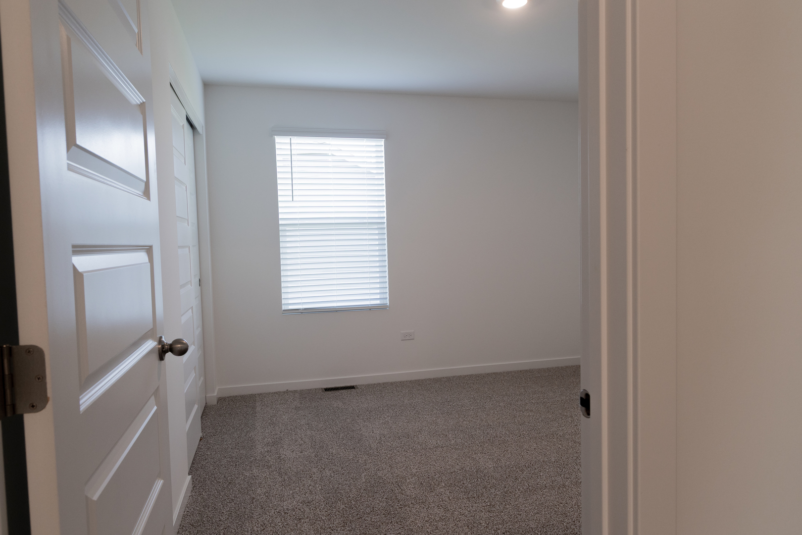 2444 Scribe Street Oswego, IL 60543 - Photo 17 of 20 a view of an empty room with a window