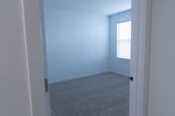 an empty room with a window