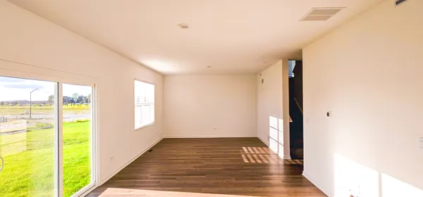 a view of an empty room and window