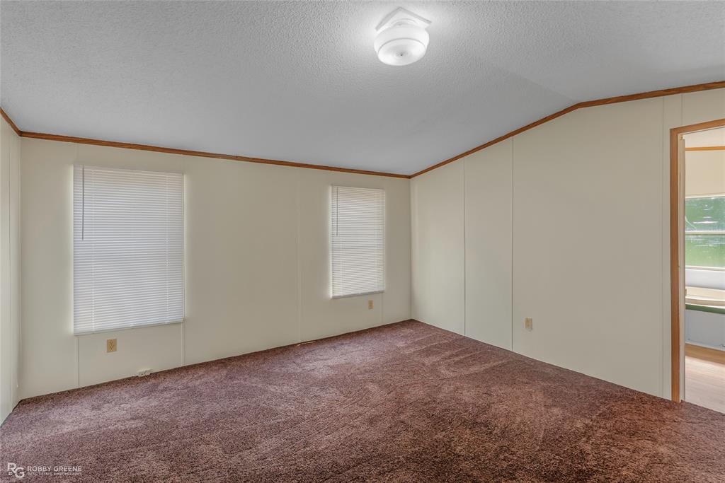 214 Springs Road Frierson, LA 71027 - Photo 13 of 21 an empty room with a empty space and window