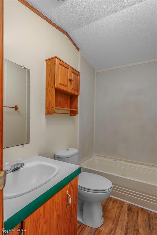 214 Springs Road Frierson, LA 71027 - Photo 21 of 21 a bathroom with a sink a toilet and shower