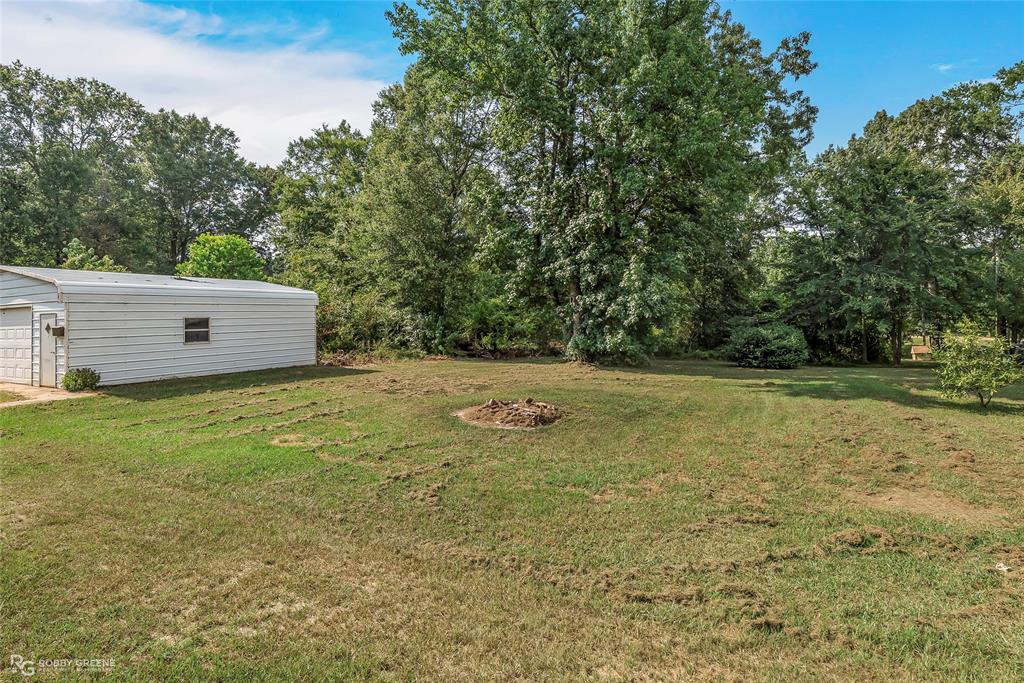 214 Springs Road Frierson, LA 71027 - Photo 5 of 21 a view of a backyard