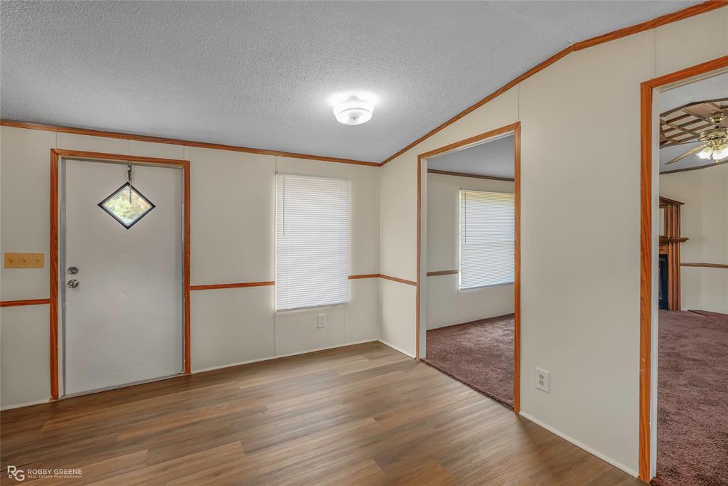 214 Springs Road Frierson, LA 71027 - Photo 10 of 21 a view of empty room with wooden floor
