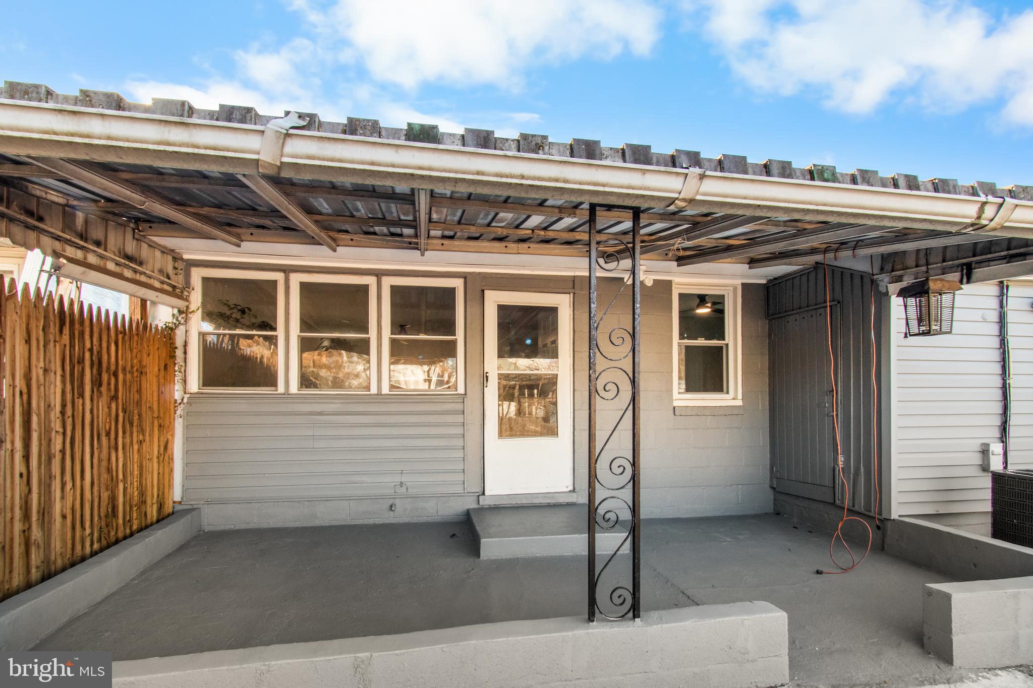 7736 Oxman Road Landover, MD 20785 - Photo 25 of 30 a view of a building with a outdoor space
