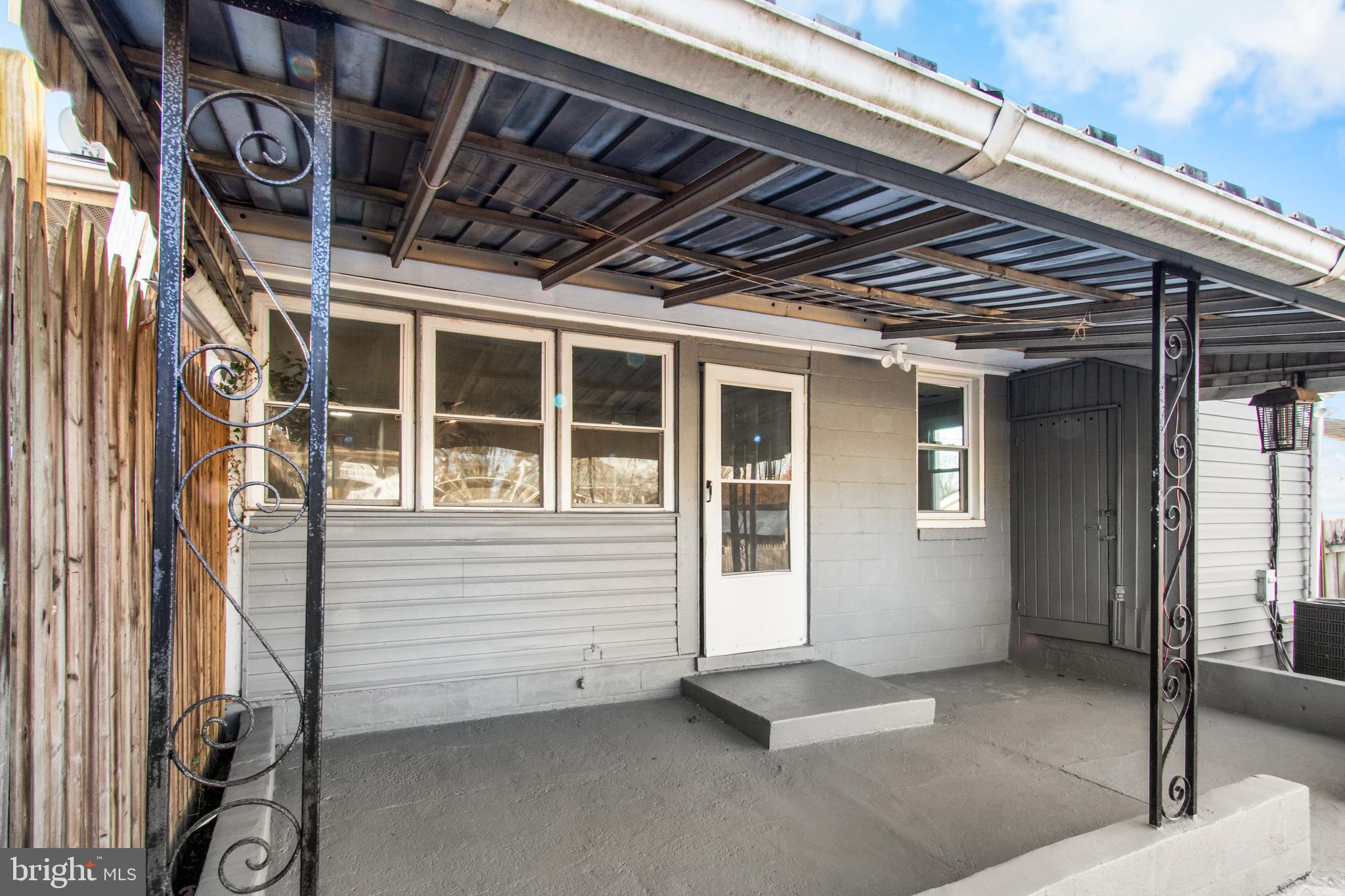 7736 Oxman Road Landover, MD 20785 - Photo 28 of 30 a view of a room with wooden walls