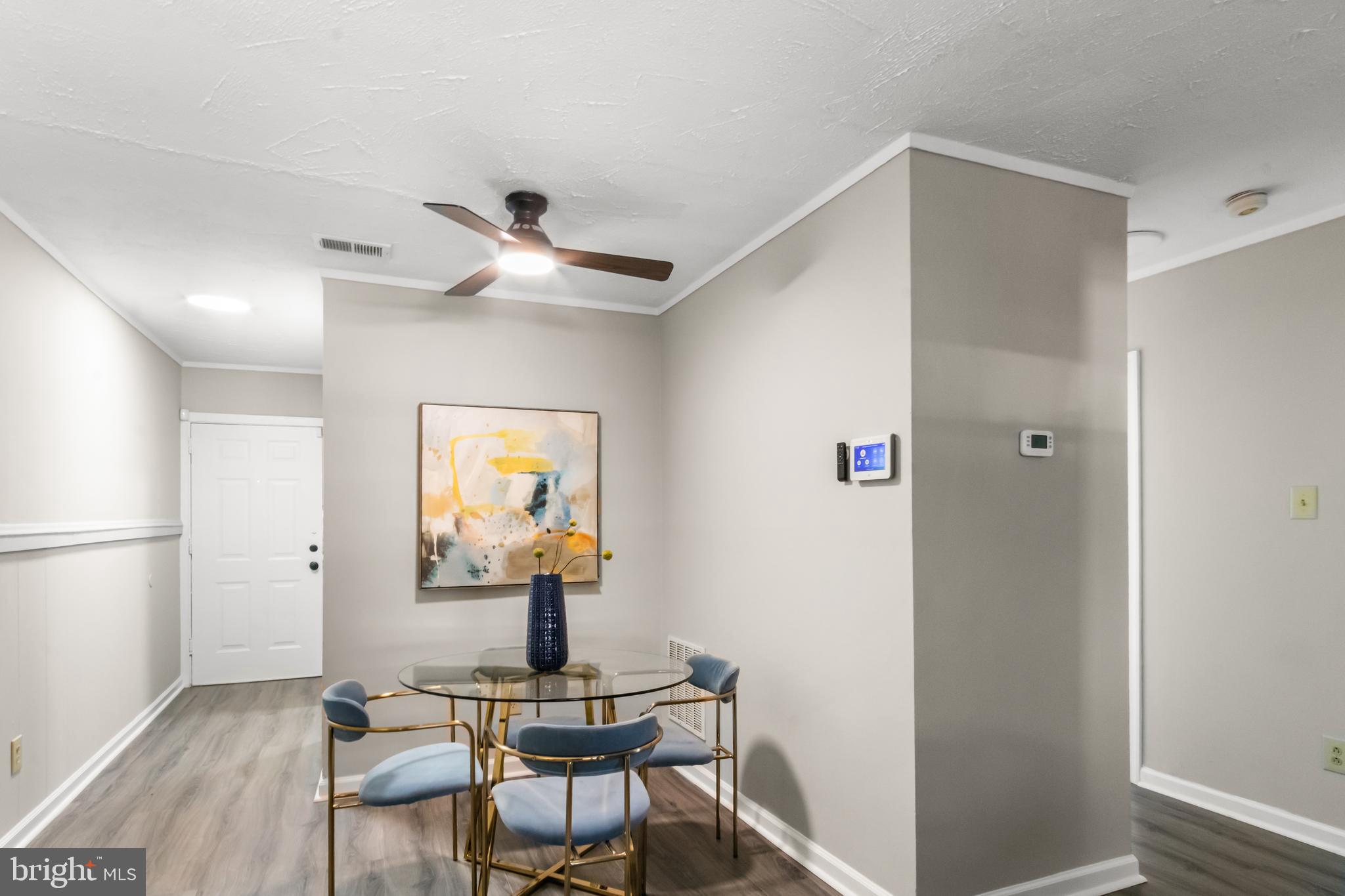 7736 Oxman Road Landover, MD 20785 - Photo 5 of 30 a workspace with furniture and a window