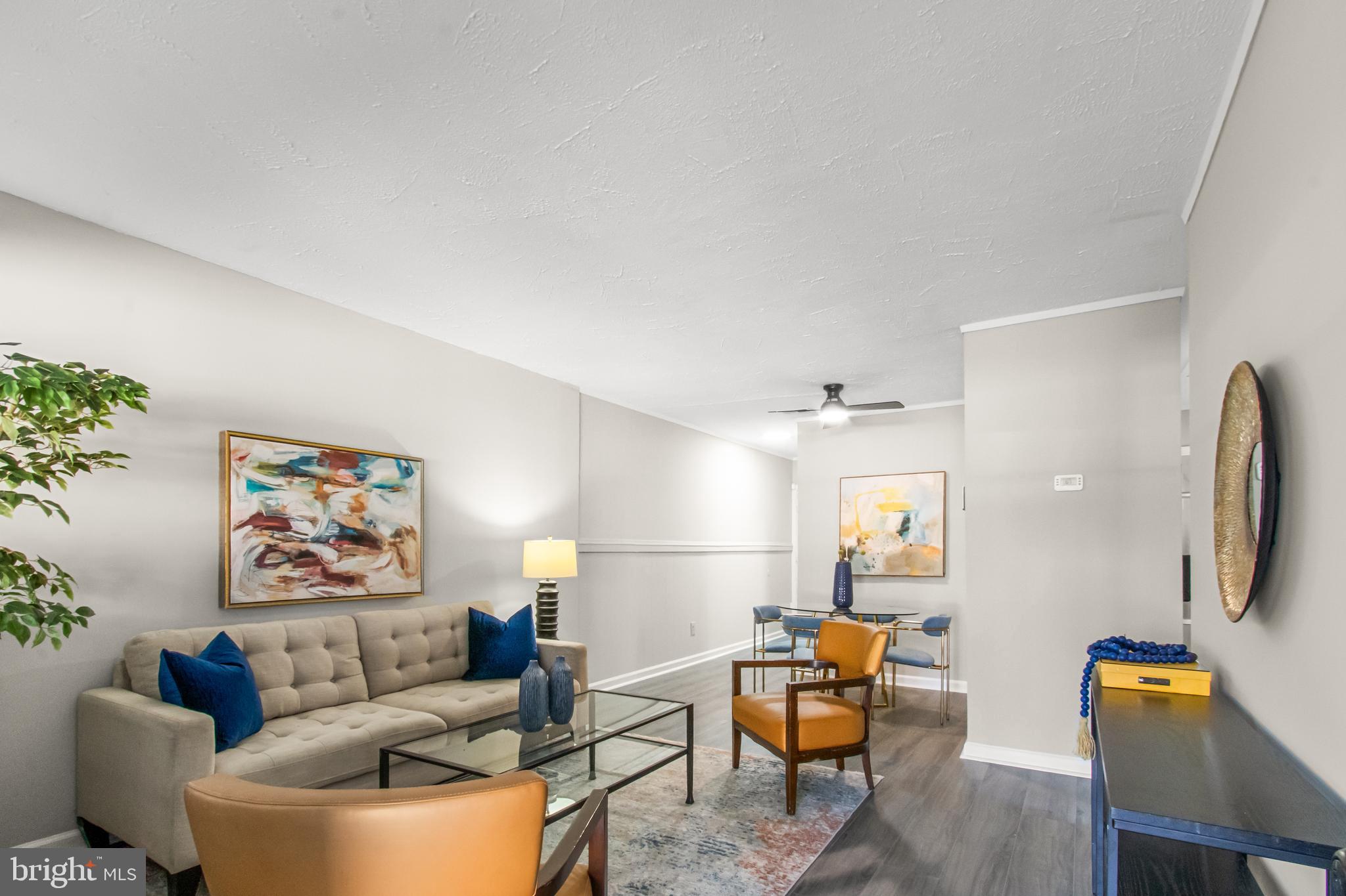 7736 Oxman Road Landover, MD 20785 - Photo 7 of 30 a living room with furniture and wooden floor