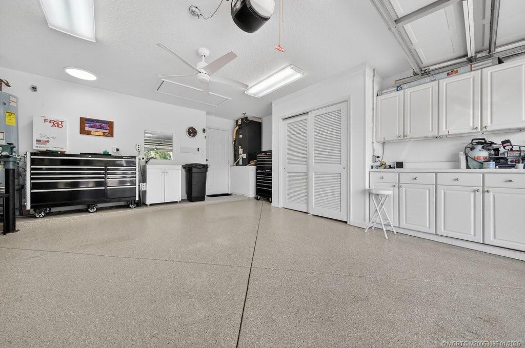 871 Southeast Westminster Place Stuart, FL 34997 - Photo 28 of 38 Immaculate Garage with Storage