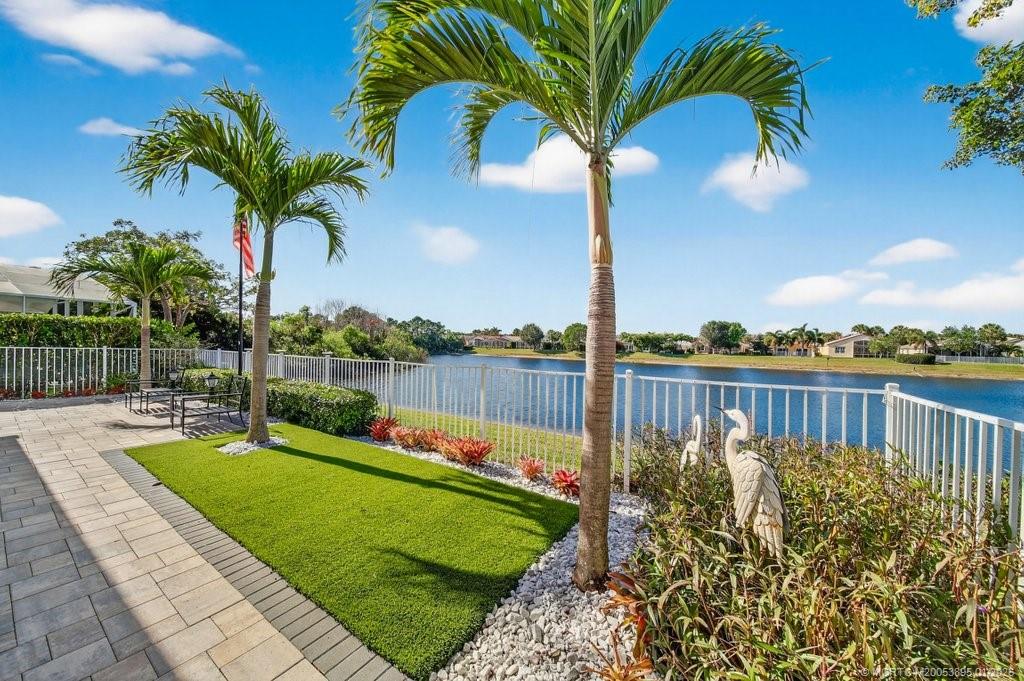 871 Southeast Westminster Place Stuart, FL 34997 - Photo 6 of 38 a view of a yard with a patio