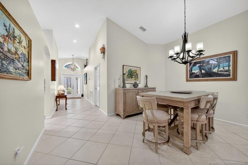 871 Southeast Westminster Place Stuart, FL 34997 - Photo 8 of 38 Tile on diagonal throughout living area