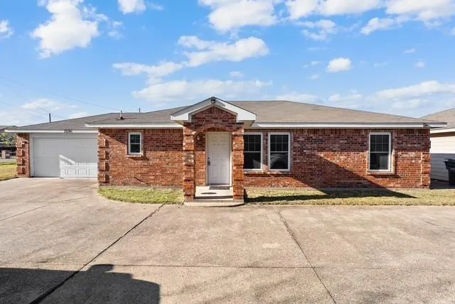 a view of a house with a patio