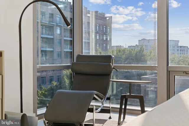 a bathroom with a double vanity sink mirror and shower