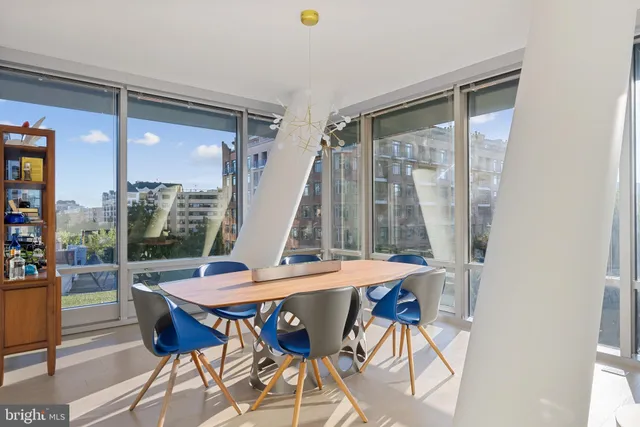 a kitchen with a stove a sink and a refrigerator