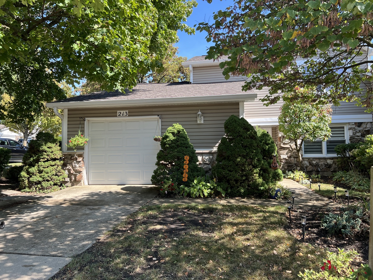 a view of a house with a tree