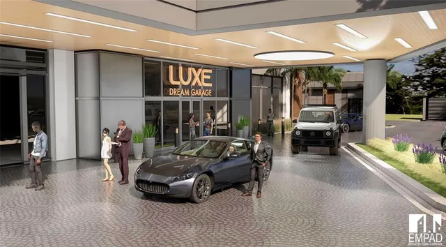 a bedroom with furniture and a large window