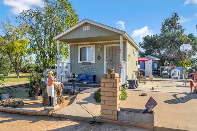 a view of the house with outdoor space