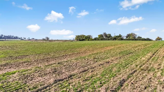 a view of swimming pool with outdoor seating